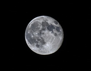 Obraz premium full moon illuminated against a dark sky showcasing detailed lunar craters and surface textures