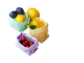 Cherries, Plums, and Lemons in Pastel Paper Bags on Pink Surface on png background