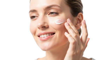 Radiant young woman applying moisturizer for a healthy skin care routine
