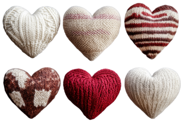 Handcrafted knitted hearts in various colors and patterns showcased together on a soft fabric background