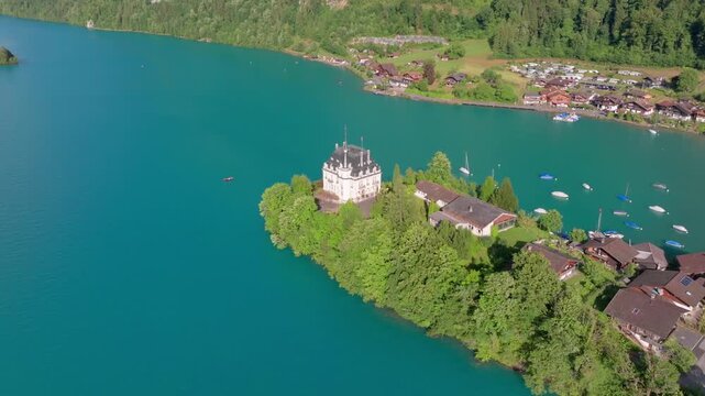 The beautiful Interlaken valley and Thunersee lake, Beatiful river at Switzerland in sunny day during summer, Aereal drone view of stunning idyllic nature scenery of lake Brienz with turquoise waters