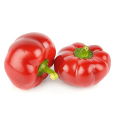 Two Ripe Red Round Peppers on a White Background