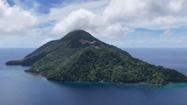 The remote, tropical island of Serua is found in the middle of the Banda Sea. This small, volcanic island is home to high marine biodiversity including a large population of sea kraits.