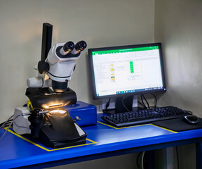diamond polishing factory, gemological microscopes in lab diamond factory to precisely inspect diamonds for quality control, grading, and polishing