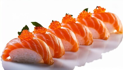 row of salmon nigiri sushi with roe garnish close up