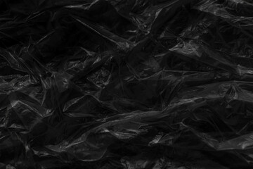 Black plastic bag texture background. Reuse and Recycle cocept.
