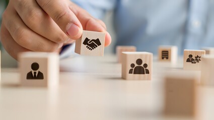 Empathy in leadership concept. Wooden block symbolizing empathy and partnership among blocks representing individuals, emotional intelligence and trust in workplace leadership and team collaboration.