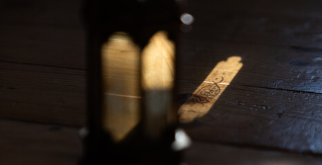 lantern with burning glowing candle. Decorative shadows. Festive greeting card, invitation for...