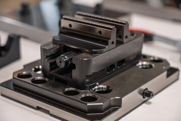 Large lathe chuck. Lathe with large chuck. Part clamping systems in CNC machines. Vice for clamping parts. Holder for clamping round parts