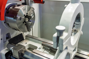 Cnc machine. The CNC lathe machine or Turning machine. Turning numerical control machine with tools and chuck. Inside view of a cnc machine. CNC lathe interior