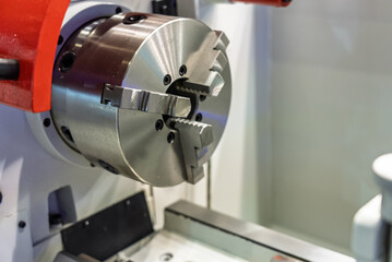 Cnc machine. The CNC lathe machine or Turning machine. Turning numerical control machine with tools and chuck. Inside view of a cnc machine. CNC lathe interior