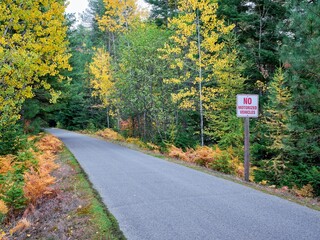  Paved bike path in autumn.