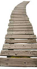 Overhead perspective of a weathered wooden boardwalk curving into the distance