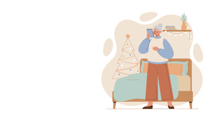 Modern senior woman using a mobile phone for a festive video call beside a Christmas tree