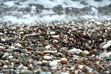 Colorful pebble stones on the beach, pebbles on the beach of Antalya, close-up, background