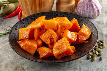 Vegan cuisine - baked pumpkin with herbs