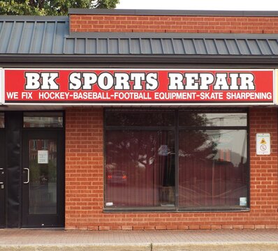 Gloucester, ON, Canada-May 23,2025:The storefront of a sports equipment repair business called "BK SPORTS REPAIR" at 2200 Montr&eacute;al Rd.
