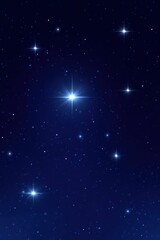 Fototapeta premium A captivating starry night sky filled with twinkling stars creates an enchanting backdrop, perfect for Christmas-themed designs. The deep blue expanse highlights five bright white stars