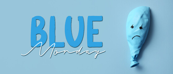 Balloon with drawn sad face on blue background