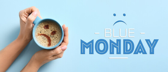 Hands holding cup of coffee with drawn sad face, top view