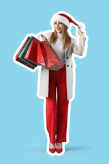 Pretty young woman in Santa hat and with shopping bags on blue background