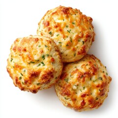 Deliciously freshly baked three-cheese scones, golden and flaky, showcase a mouthwatering blend of flavors. Perfectly positioned against a clean white background, they invite indulgence.