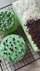 Pandan sponge cake with cheese topping and sprinkles