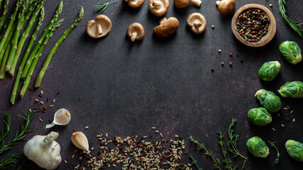 An assortment of ingredients for meal prep forming a frame with copy space.