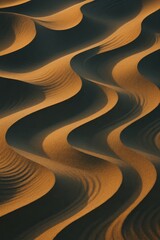 Abstract golden sand dunes forming smooth wavy patterns under sunlight, natural desert texture background.