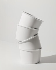 White paper bowl stacked on a white background