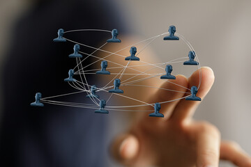 Concept of communication and networking visualized. Connections between people, teamwork, and global network, representing partnership and coope