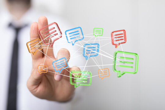 Businessman hand touches a digital interface with communication icons. Concept of social media, networking and business technologies.