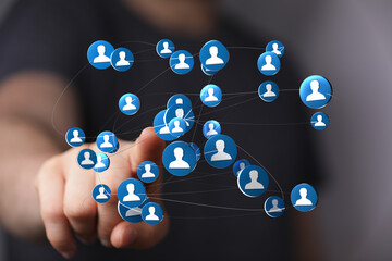 Connecting through social media concept. Digital interface network of people, digital interface of users. Social media concept with hand touchin