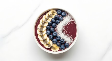 Vibrant and Healthy Acai Bowl Flat Lay on White Marble.