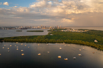 Yachting in Miami, Florida. Recreational yachts and fishing boats anchored in Biscayne Bay harbor....