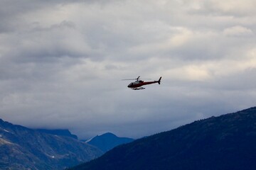 Low flying helicopter on an overcast day