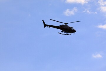 Silhouette helicopter in flight