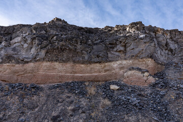 Basaltic Volcanic rocks / Old Basaltic Lava Flows on Old alluvium. near Eagle Mointain, Inyo County. California State Route 127. The Amargosa Valley. Mojave Desert / Basin and Range Province. 
