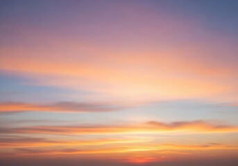 A peaceful evening sky with scattered cumulus clouds glowing in warm orange, pink, and light blue hues. The sun sets below the horizon, casting soft light rays upward. Captured in full HD from a groun
