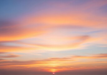 A peaceful evening sky with scattered cumulus clouds glowing in warm orange, pink, and light blue hues. The sun sets below the horizon, casting soft light rays upward. Captured in full HD from a groun