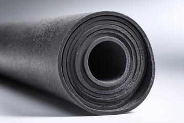 Automotive wheel well liner made from recycled polypropylene plastic displayed in clean studio showcasing durable sustainable vehicle component for eco friendly manufacturing and circular economy.