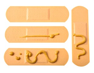 Several Band-Aids Decorated with a Peanut Butter Style Cream