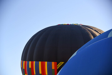 Obraz premium Balloons Being Inflated at Hot Air Balloon Festival