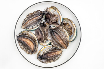 Fresh abalone ingredients on a pure white background