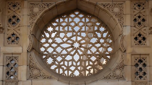 intricate depiction of the decorative perforated stone screen architecture found in a historic