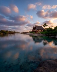 Tranquil Waterfront Lodge with Reflection at Sunset in Tropical Paradise