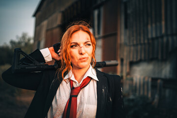 Redhead woman in a suit with a rifle. Special agent.