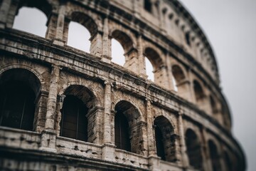 Fototapeta premium Ancient stone arches rise against a cloudy sky.