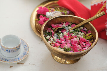 Close-up of Javanese Traditional Ceremony Offering with Rose Petals and Jasmine
