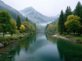 Misty Mountain Lake Reflecting Autumn Trees With Green and Yellow Foliage Under a Cloudy Sky